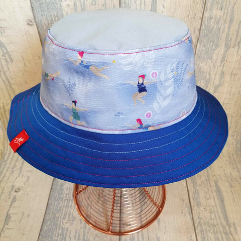 Reversible swimmer's festival bucket hat in blues and shocking pink