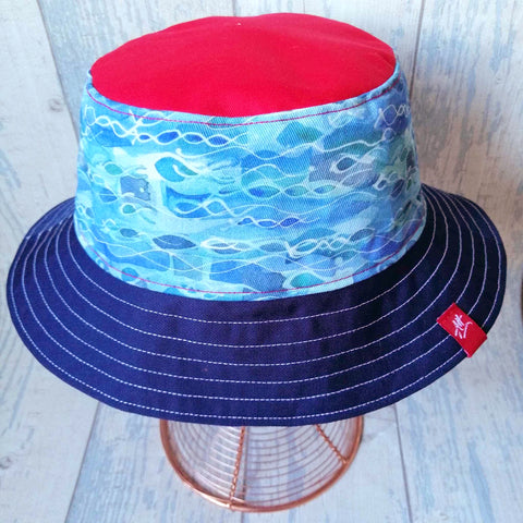 Reversible swimmer's festival bucket hat in red, white and blue