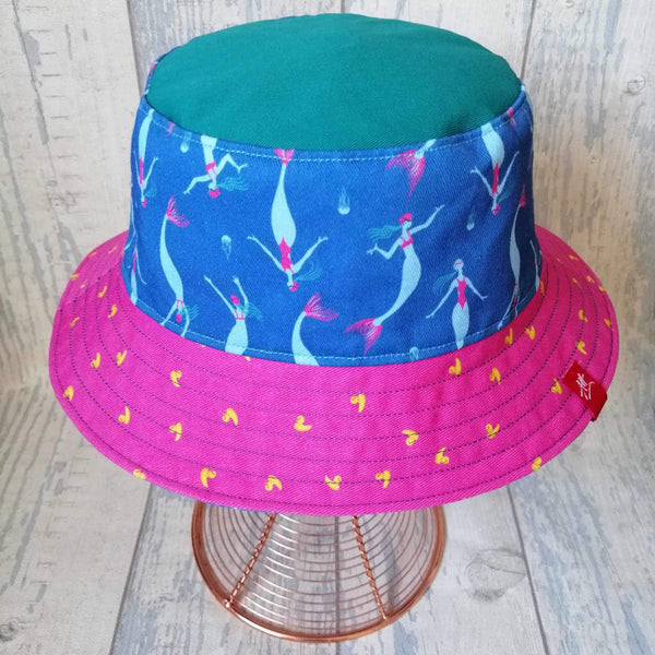 Reversible swimmer's festival bucket hat with mini mermaids