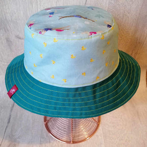 Reversible swimmer's festival bucket hat in forest green and cornflower blue