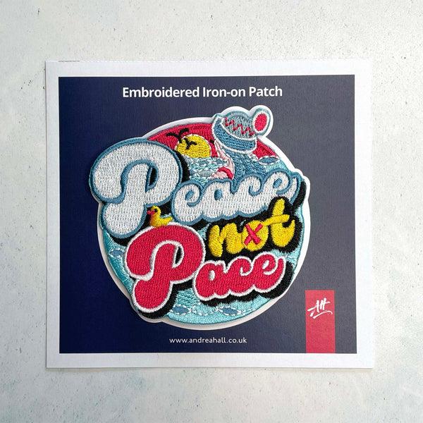 Embroidered iron-on patch. Peace Not Pace