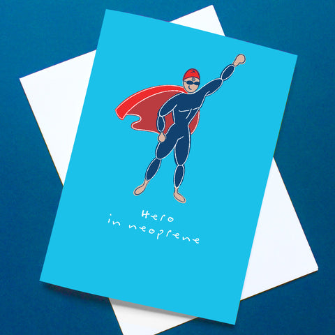 Illustration of a swimmer in a wetsuit and red cape, with text: Hero in neoprene.