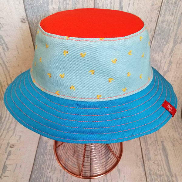 Reversible swimmer's festival bucket hat with new Kingfishers design