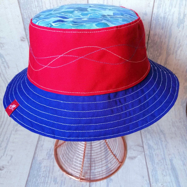 Reversible swimmer's festival bucket hat in red, white and blue