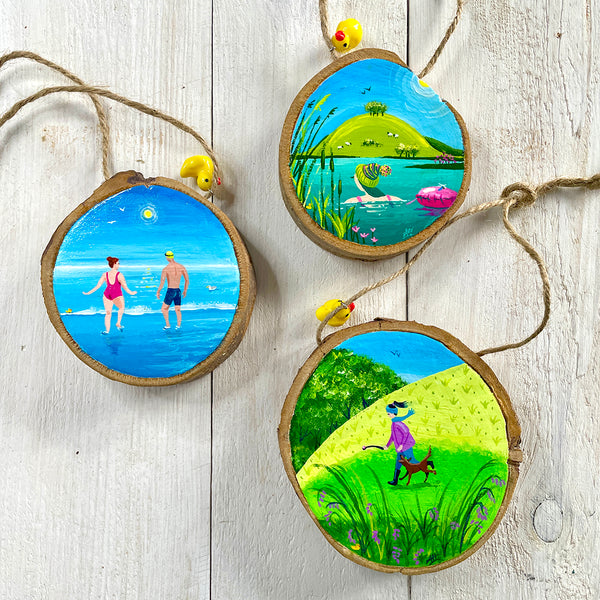 Set of three original illustrated wood slice hanging decorations