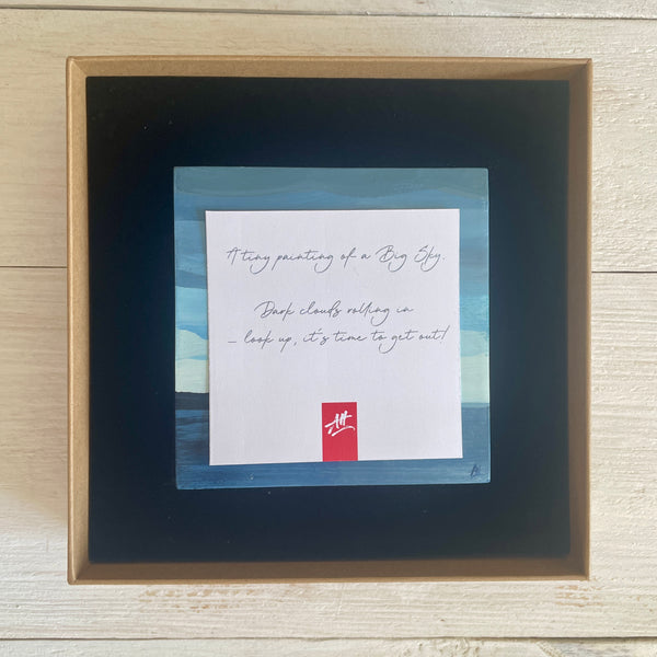 Boxed artwork with description card