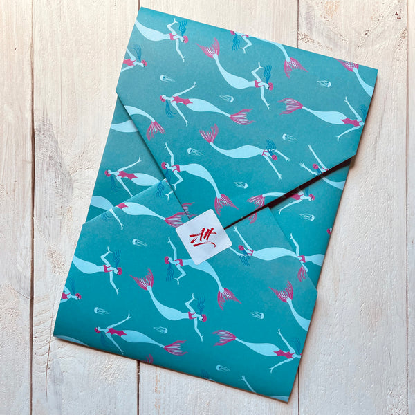 Quality gift wrap for wild swimmers. Mermaid design